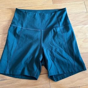 Girlfriend Collective High Rise Run Shorts in Moss